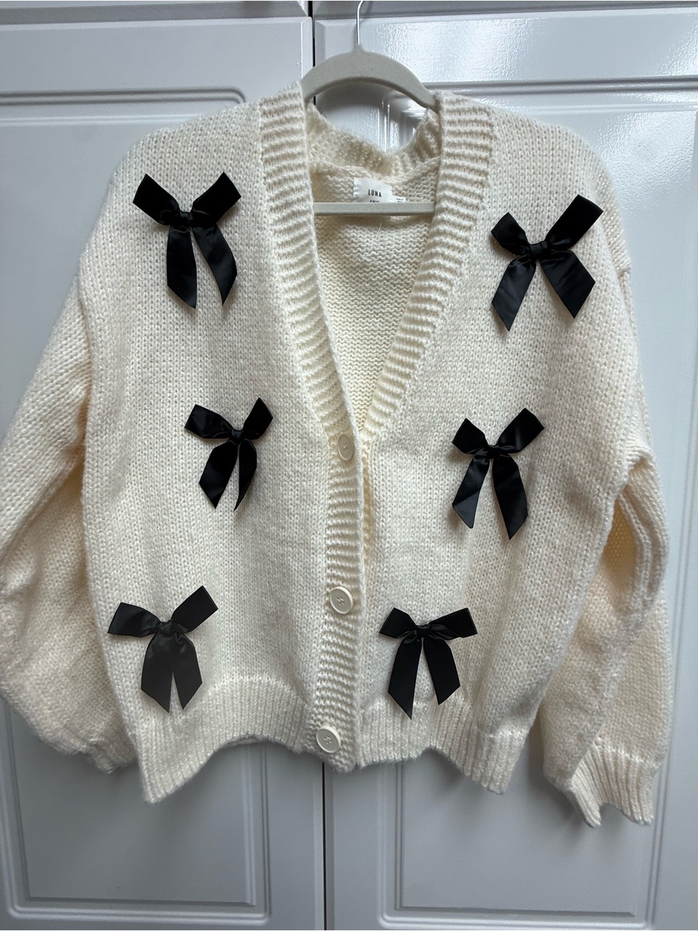 Luna Ivy Cream Knit Cardigan with Black Bow Accents Large